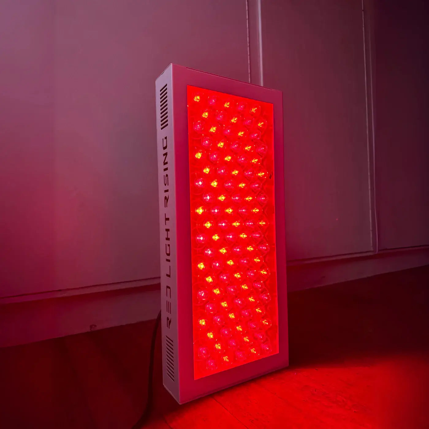 The Half Stack 3.0 Red Light Therapy Panel floor seated